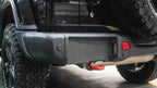 close-up of 2007–2018 Jeep Wrangler JK 10th Anniversary rear bumper installed on black Rubicon Wrangler
