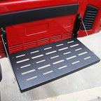 2007–2018 Jeep Wrangler JK foldable tailgate table installed on red Jeep Wrangler JK