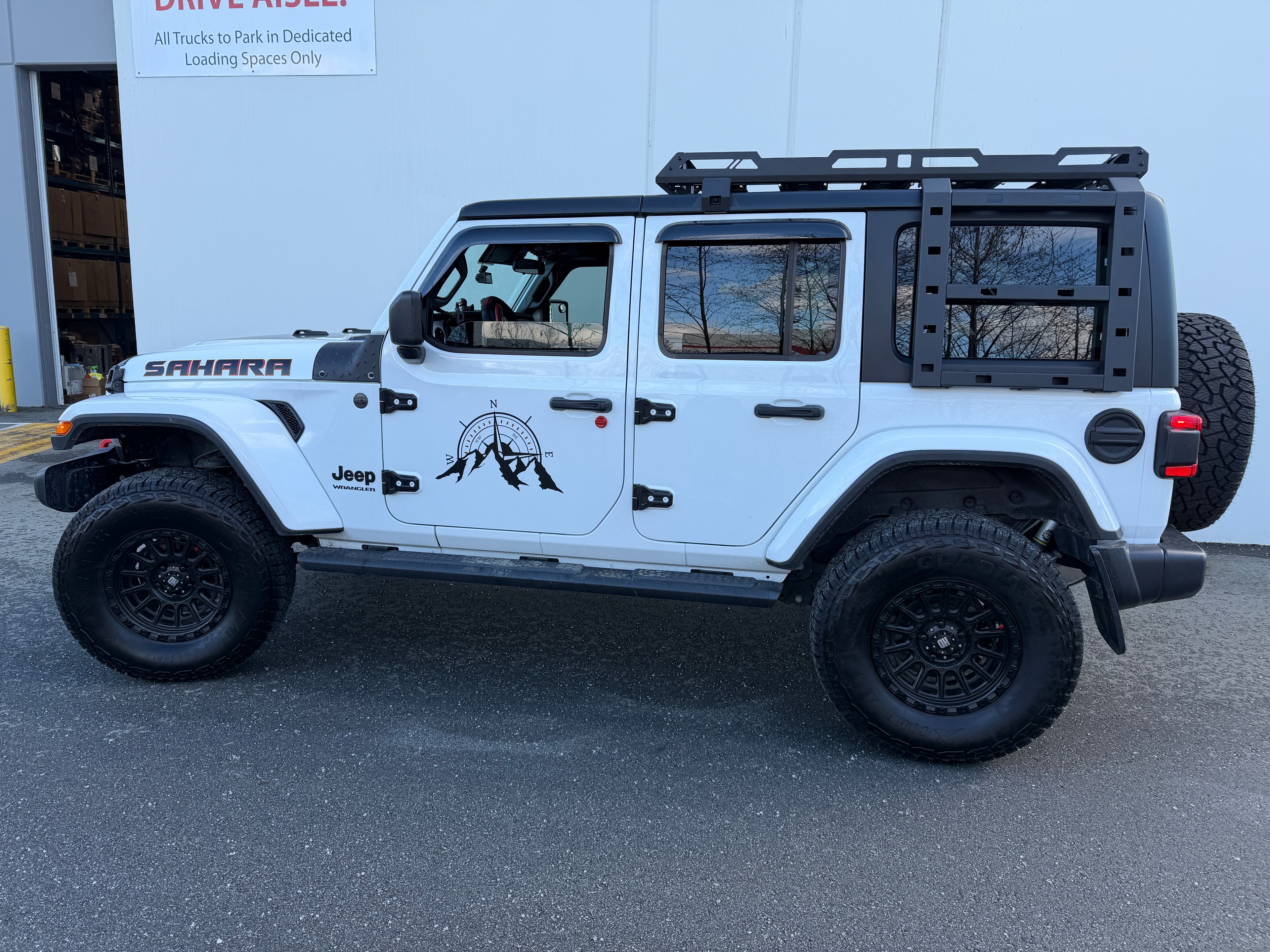 2018–2026 Jeep Wrangler JL Hurricane roof rack with side ladders installed on Sahara model