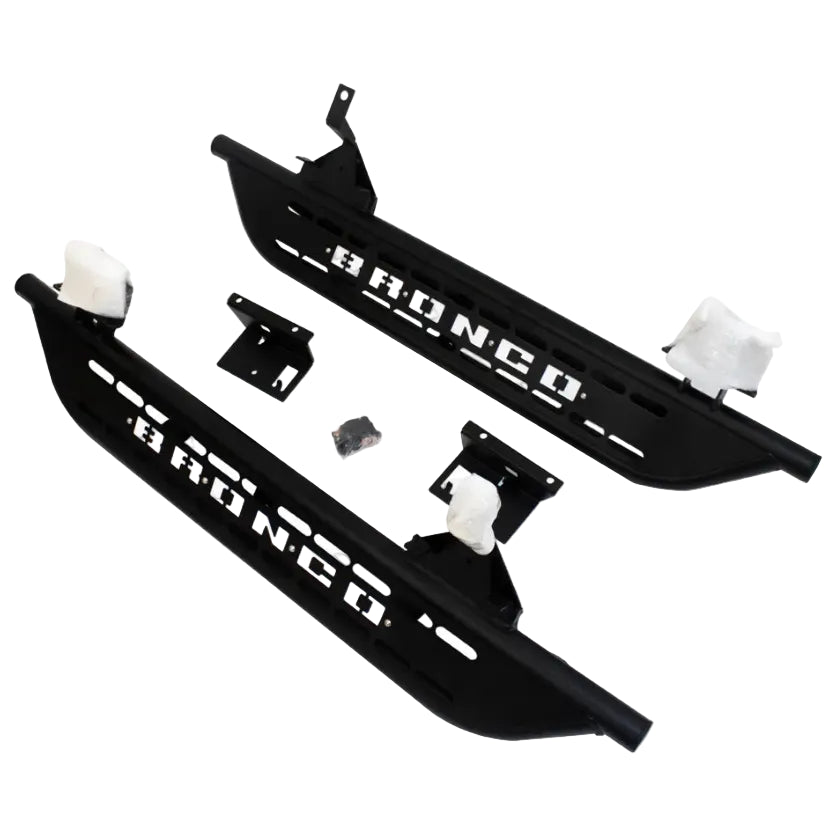 Packaged view of cab length side steps for 2021-2023 Ford Bronco 2 door textured black with white Bronco lettering